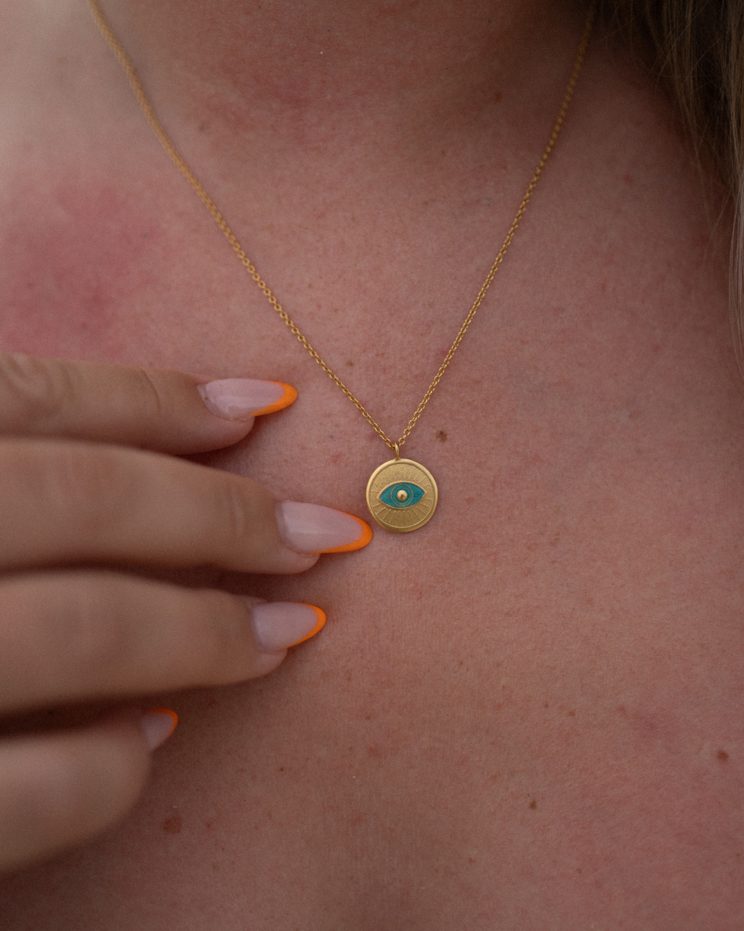 Necklace with magic eye in turquoise - 18 carat gold plated
