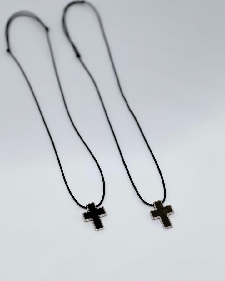 Leather necklace with cross pendant in sterling silver