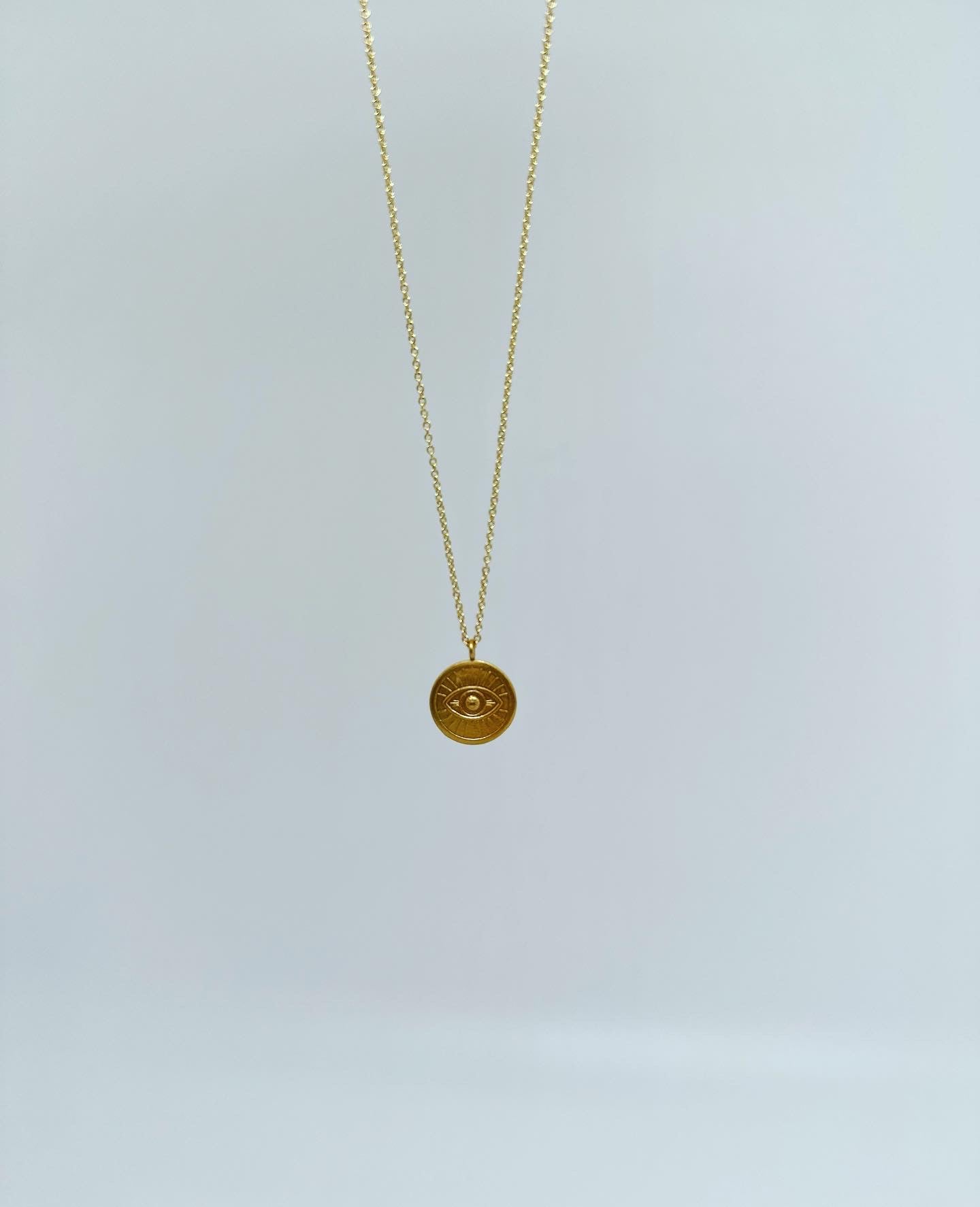 Necklace with magic eye in turquoise - 18 carat gold plated