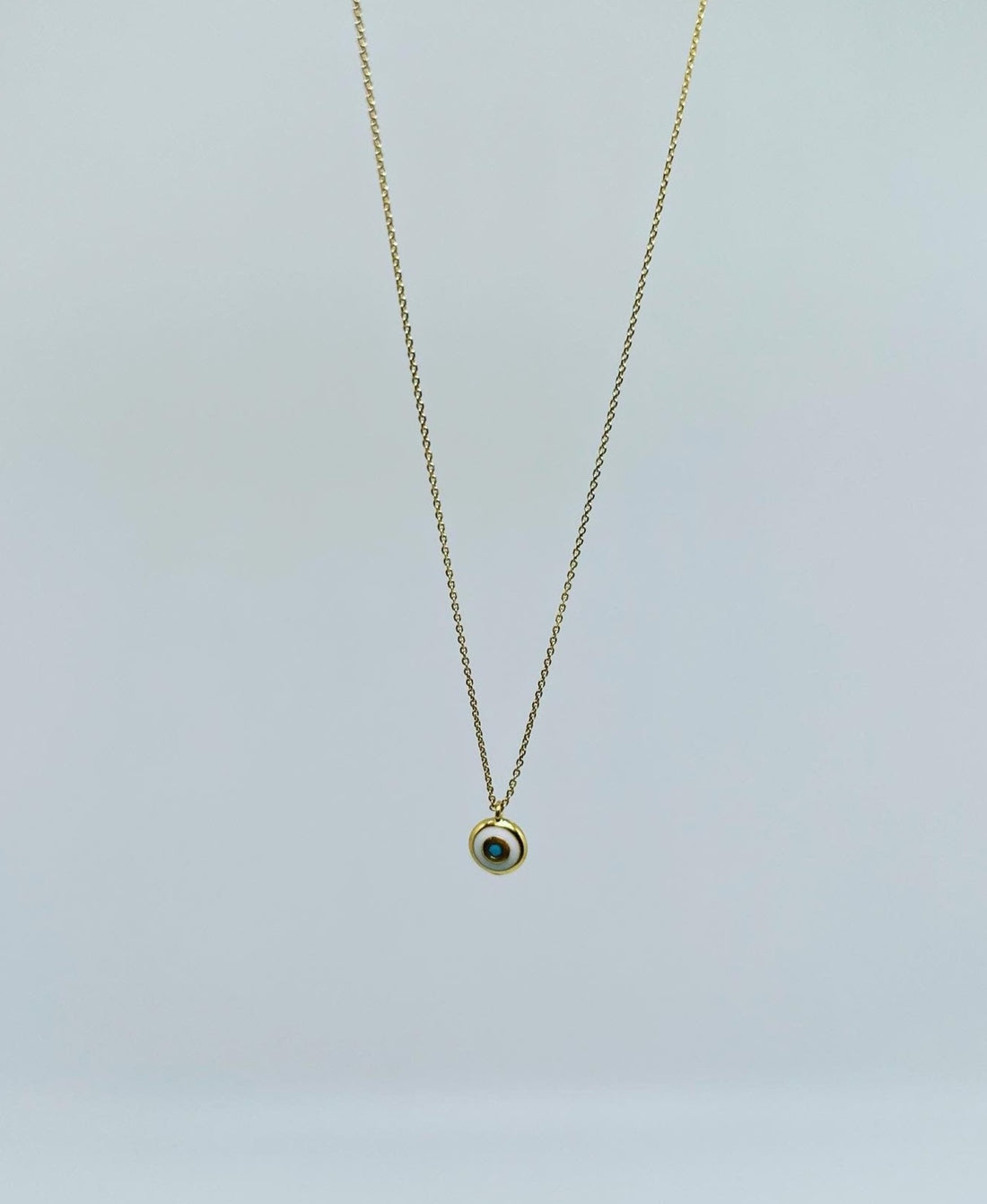 Magic eye necklace 18k gold plated