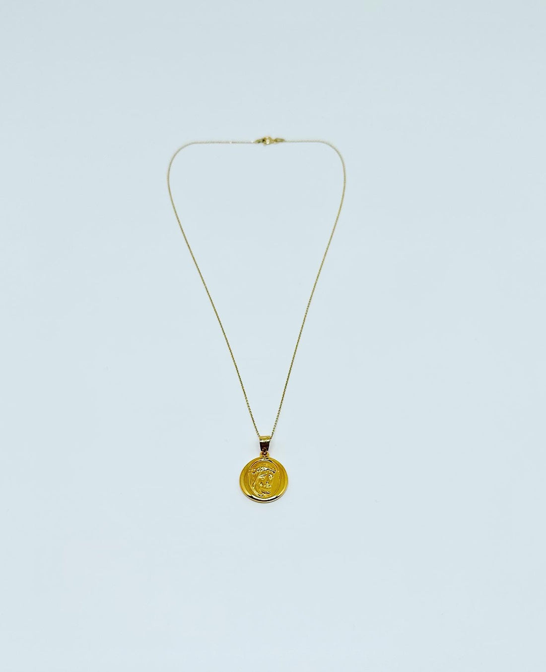 Necklace with Madonna medallion 18 carat gold plated